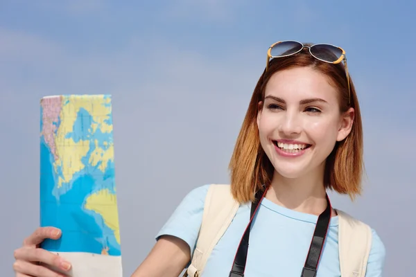 Woman holding map — Stock Photo, Image