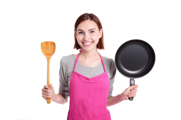 Gelukkig jonge huisvrouw koken — Stockfoto