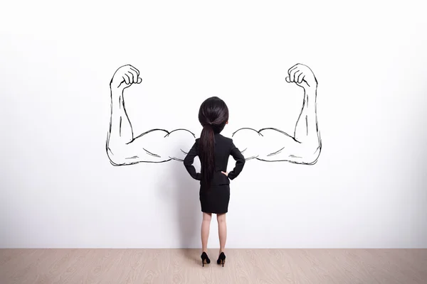 Woman with drawn  sketched strong and muscledarms — Stock Photo, Image