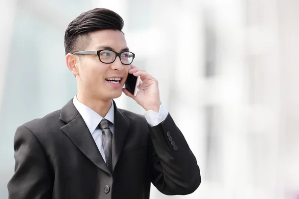 Business man talking on smart phone — Stock Photo, Image