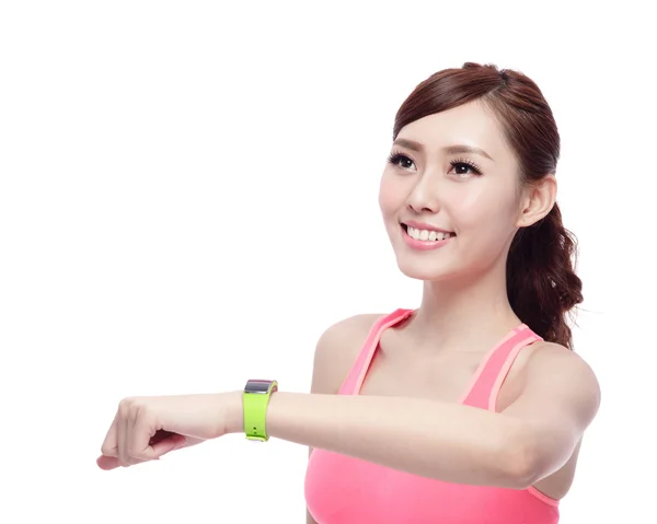 Deporte mujer usando reloj inteligente —  Fotos de Stock