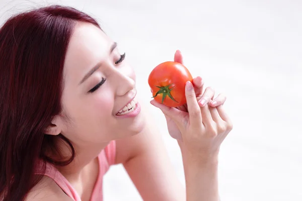 Health girl show tomato — Stock Photo, Image