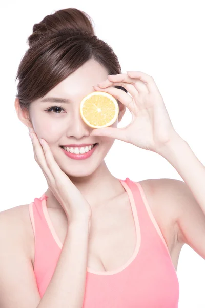 Woman showing  orange — Stock Photo, Image