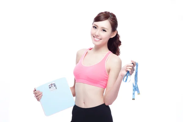 Sport girl hold weight scale — Stock Photo, Image