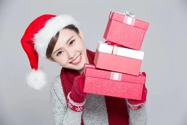 Woman holding Christmas gifts Stock Image
