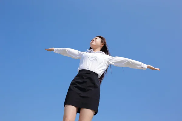 Business woman with arms up — Stock Photo, Image