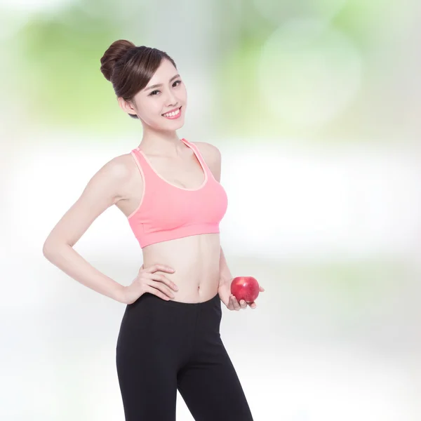 Mujer mostrando manzana — Foto de Stock