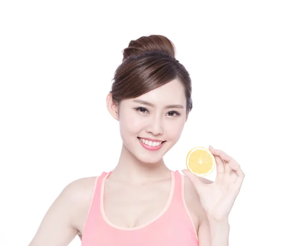 Woman showing  orange — Stock Photo, Image