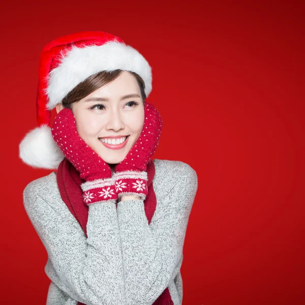 여자 산타 모자 포즈 입고 — 스톡 사진