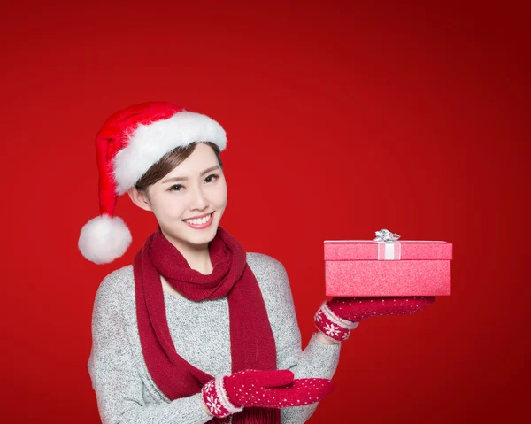 Woman holding Christmas gift — Stock Photo, Image