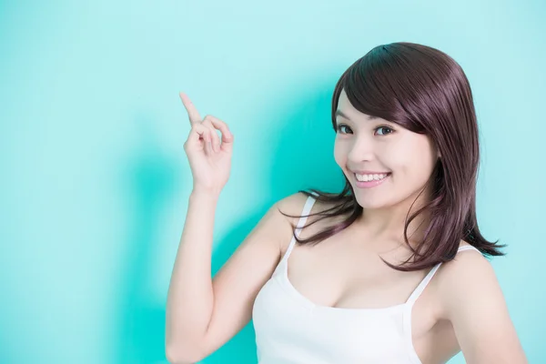 Young woman showing  something — Stock Photo, Image