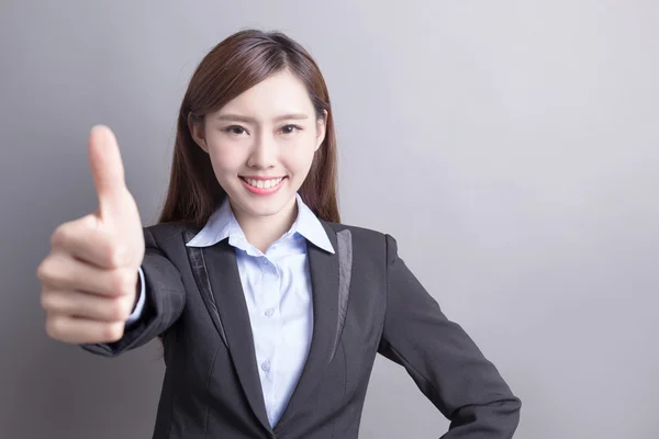 Mulher de negócios mostrando polegar para cima — Fotografia de Stock