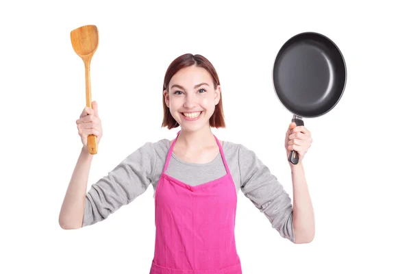 Jonge huisvrouw koken — Stockfoto