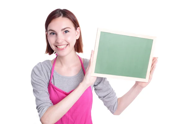 Housewife showing Blank green chalkboard — Stock Photo, Image