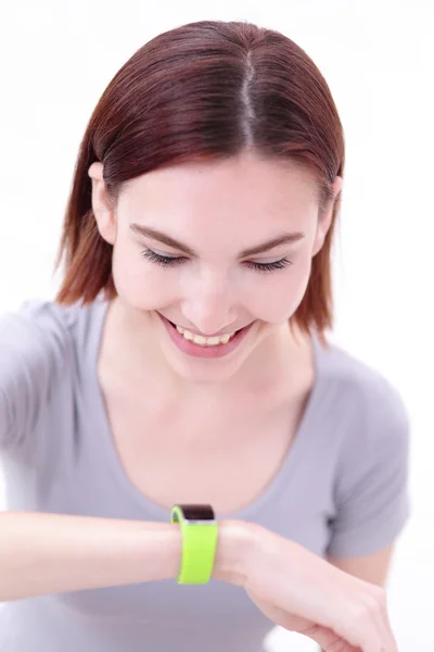 Smile woman look smart watch — Stock Photo, Image
