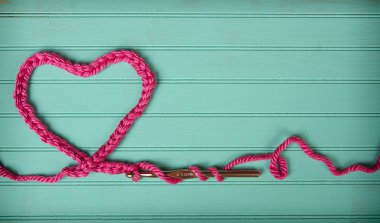 A crochet chain in the shape of a heart clipart