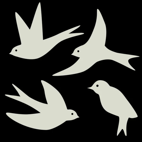 Set om fyra svälja fågel silhuetter — Stock vektor