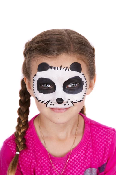 Chica joven con pintura facial de carnaval panda aislada en blanco — Foto de Stock