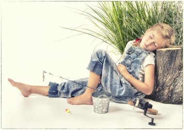 Child or young girl taking a nap or sleeping while fishing clipart