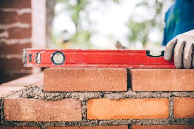 İnşaat işçisi, çimento veya tuğla döşeme ve duvar oluşturma mason. Ayrıntı düzeyi aracı