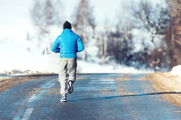 Fitness man, jogger kör, förberedelser och utbildning utomhus — Stockfoto