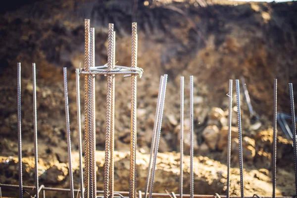 Reinforced steel bars on new construction foundation site — Stock Photo, Image