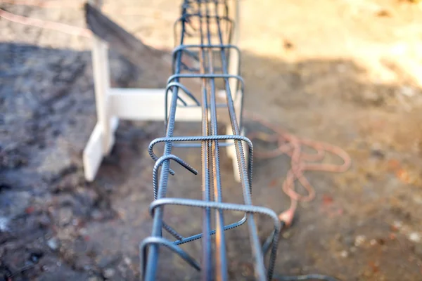 Reinforced heavy duty steel bars on new construction foundation site, infrastructure details and tools — Stock Photo, Image