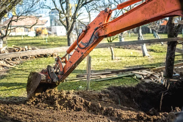 트랙 유형 로더 굴 삭 기 기계 earthmoving 하 고 지구 암석에 수평 — 스톡 사진