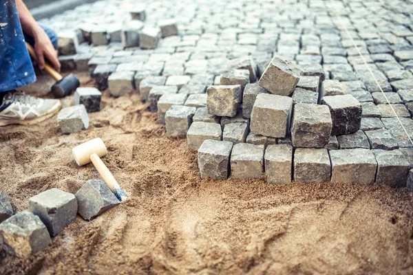 Paving stones on pavement terrace, construction details of cobblestone pavement blocks — 图库照片