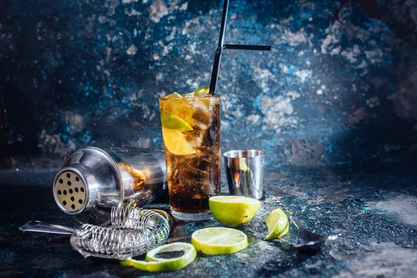 Cuba libre drink, alcoholic beverage with lime and ice served in restaurant and pub