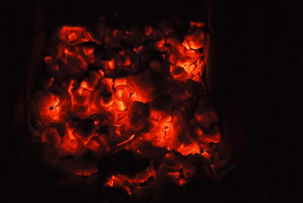 Red hot coals on black — Stock Photo, Image