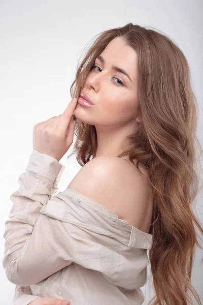 Woman with long hair and a shirt. — Stock Photo, Image