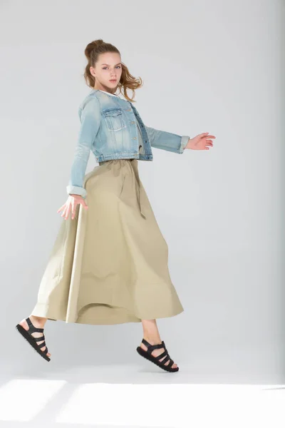 Girl Jumps Poses Studio Light Background Clothes Long Green Skirt 스톡 이미지