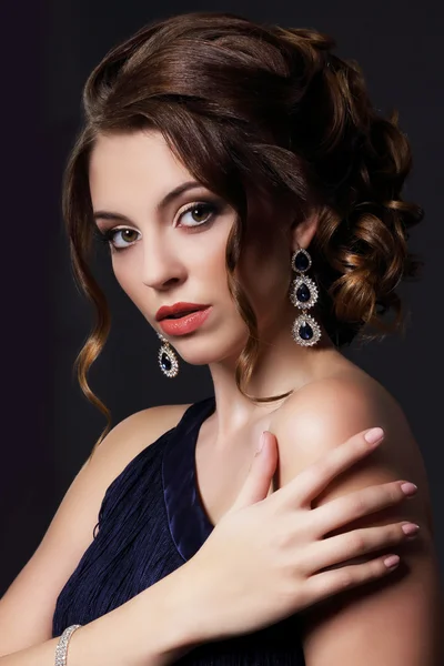 Luxurious Rich Lady with Stylish Earrings Stock Image