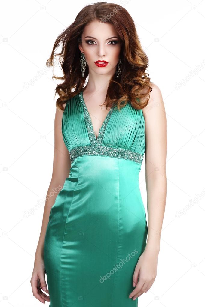 Luxury. Shapely Woman in Silky Sleeveless Classic Dress