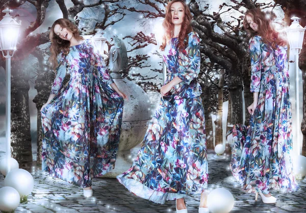 Inspiration. Fantasme. Femmes en robes fleuries parmi les arbres — Photo