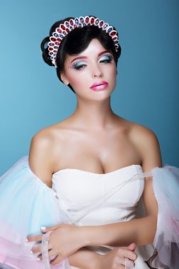 Inspiration. Fashion Model with Dramatic Theatrical Makeup and Diadem clipart