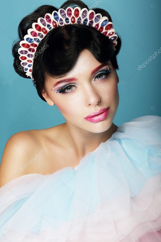 Artistic Woman with Fantastic Makeup and Diadem