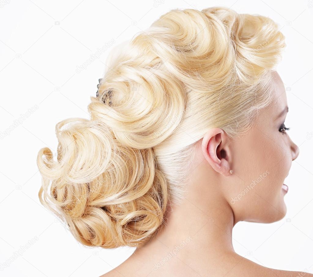 Elegance. Rear View of Blonde with Festive Hairstyle