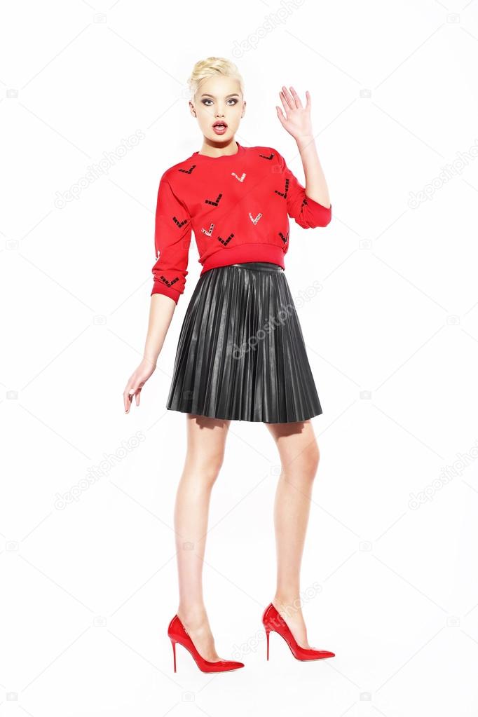 Glamorous Woman in red Blouse and Black Skirt Stock Photo by ...