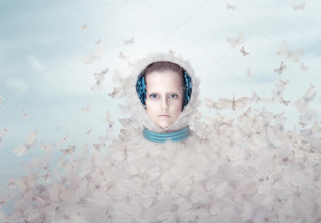 Fantasy. Futuristic Woman with Flying Butterflies