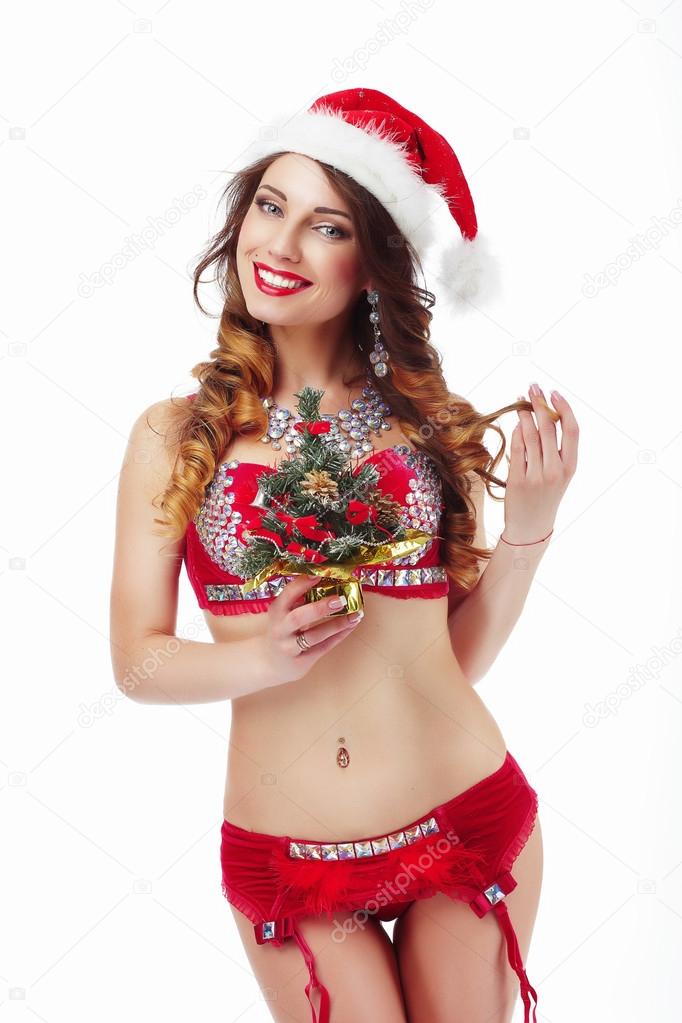 Xmas. Funny Snow-Maiden in Santa Claus Costume