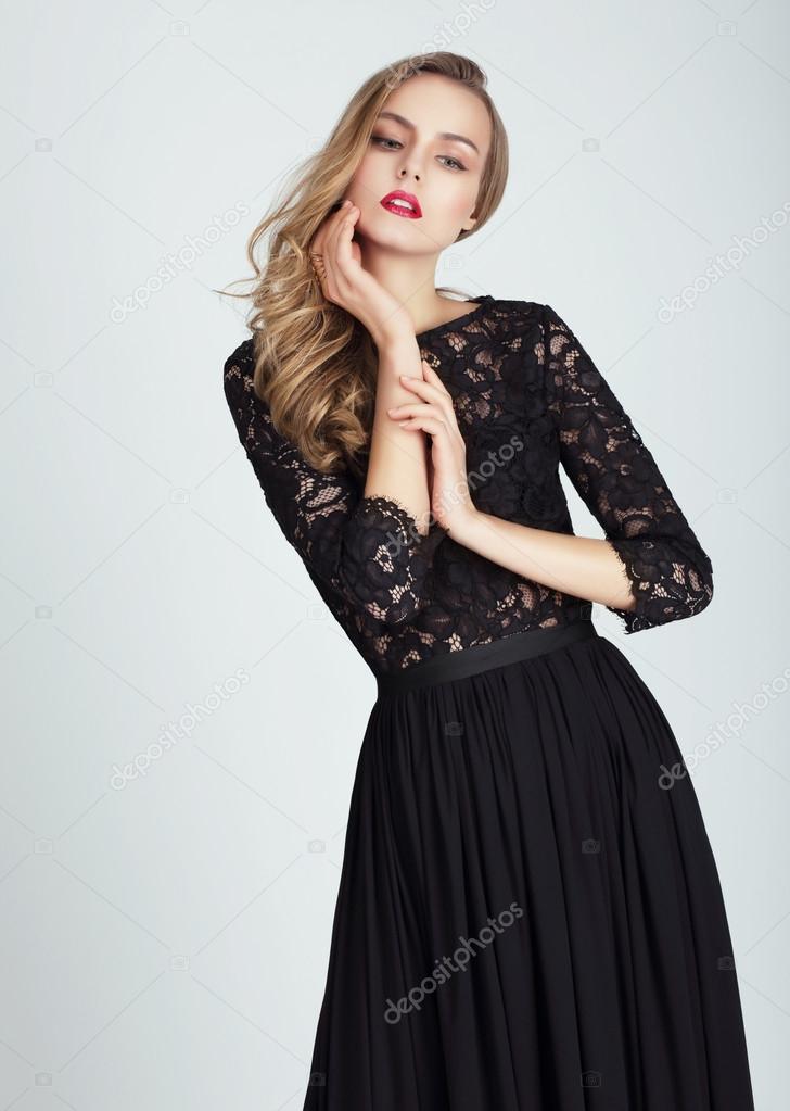 Beautiful young woman in dress.