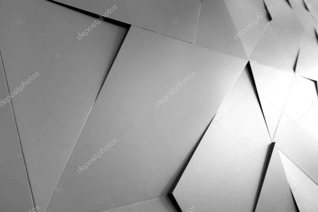Abstract geometric background of the wall. Grey wall texture abstract background. Simple abstract wallpaper.