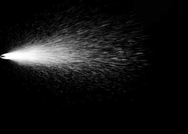 Water Spray against Black Background. Aerosol Sprays Small Drops of Water.