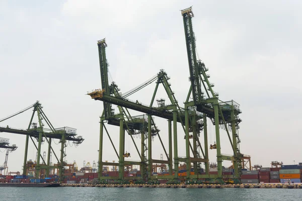 Singapore commercial port in Singapore. It's the world's busiest port in terms of total shipping tonnage, it transships a fifth of the world shipping containers.
