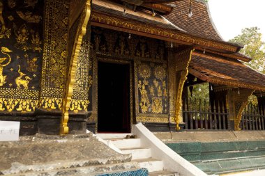 Laos 'un kuzeyindeki UNESCO dünya mirası kasabası Luang Prabang' daki ikonik tapınak Wat Xieng Tangası..