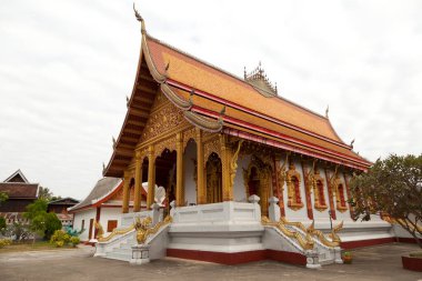 Laos 'un kuzeyindeki UNESCO dünya mirası kasabası Luang Prabang' daki ikonik tapınak Wat Xieng Tangası..