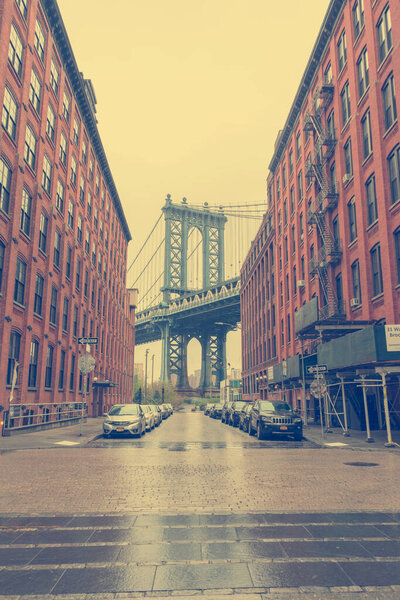 Manhattan bridge view from Brooklyn Dumbo neighborhood in NEW YORK CITY,NY