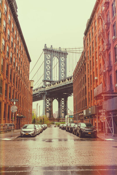 Manhattan bridge view from Brooklyn Dumbo neighborhood in NEW YORK CITY,NY